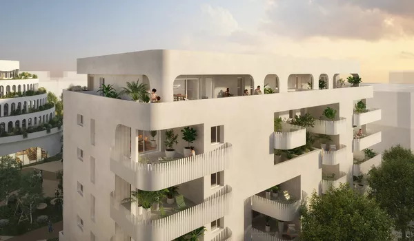 Résidence Movimento : terrasses à protection solaires et panneaux solaires en toiture